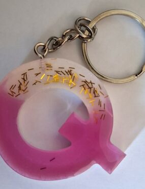 Porte Clé Q rose paillettes et noir